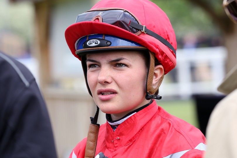 Megan Nicholls Wearing Red Silks