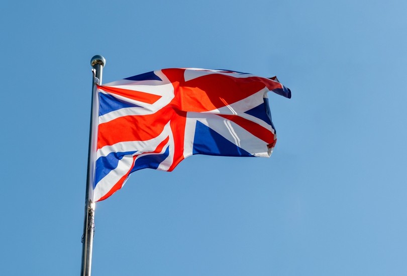 British Flag Waving Against Light Blue Sky