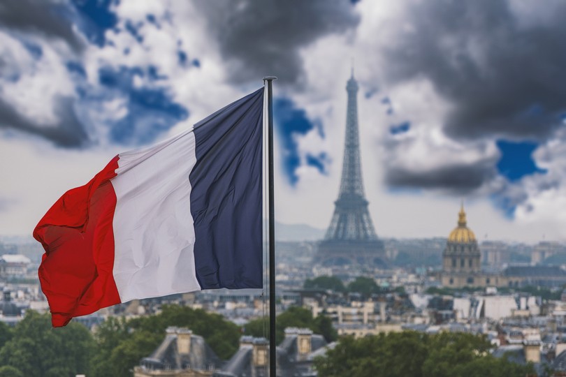 French Flag Against Paris Skyline